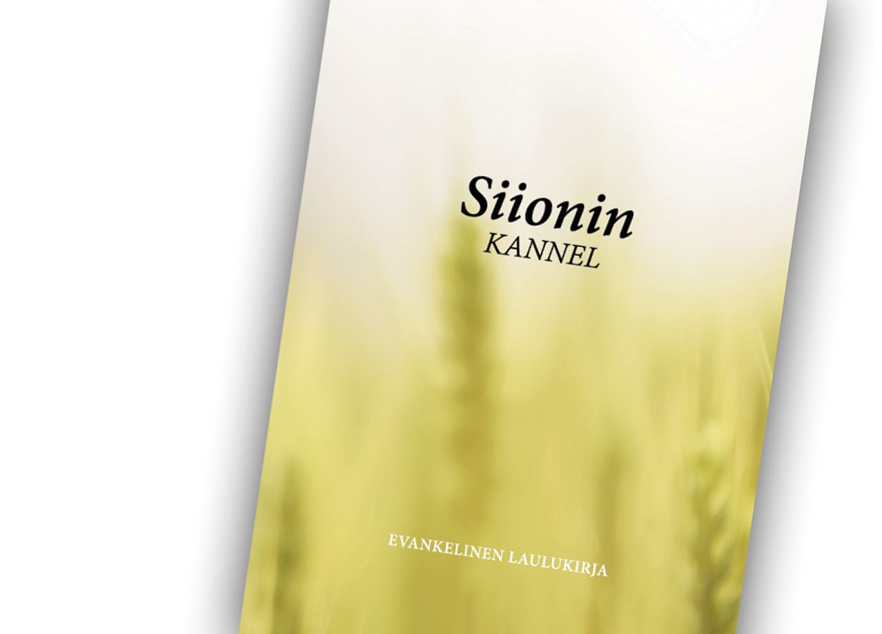 Laulukirjan vihreät kannet ja teksti Siionin Kannel